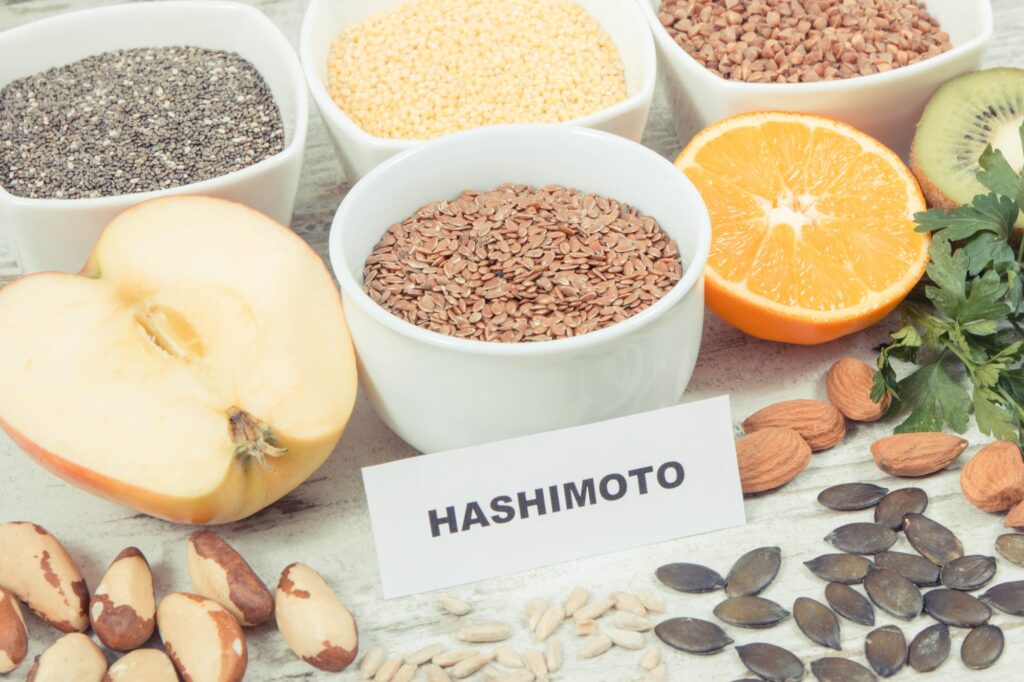 Inscription hashimoto with products and ingredients as source vitamins for healthy thyroid